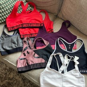 Lot of 7 Under Armour sports bras.